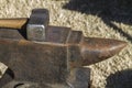 Anvil and hammer in bright sunlight Royalty Free Stock Photo