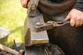 Blacksmith hammering hot steel Royalty Free Stock Photo