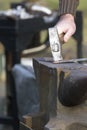 Blacksmith, ironsmith hitting hot steel Royalty Free Stock Photo