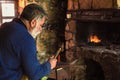 Blacksmith manually forging the molten metal