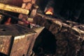 Blacksmith manually forging the molten metal