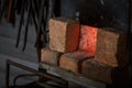 Blacksmith oven fire in workshop for metal heeting Royalty Free Stock Photo
