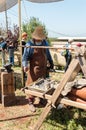 Blacksmith - participant in knight festival shows his skill in Goren park in Israel