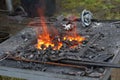 Blacksmith portable furnace with burning coals Royalty Free Stock Photo