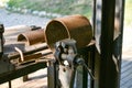 Blacksmith`s clamp. Metal clamping device on an old workbench. Vise desktop