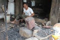 a blacksmith at work, rural Indian lifestyle