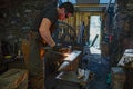 Blacksmith working at Finch Foundry Royalty Free Stock Photo