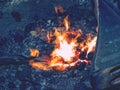 Blacksmith working with iron to make horseshoe