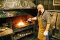 Blacksmith working in workshop Royalty Free Stock Photo