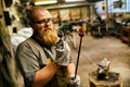 Blacksmith working in workshop Royalty Free Stock Photo