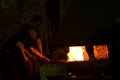 The blacksmith works at night Royalty Free Stock Photo
