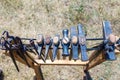 Blacksmithing tools laid out on a stand.