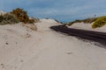 Blacktop Road Winding Through the Amazing Surreal White Sands of New Mexico Royalty Free Stock Photo