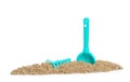 The blade and rake lie in kinetic sand. Game for children