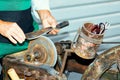 Blade tool sharpening with vintage grinding wheel Royalty Free Stock Photo