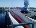 Blades of the wind farm are fixed on the deck of the ship Royalty Free Stock Photo