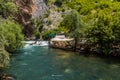 BLAGAJ, BOSNIA AND HERZEGOVINA - JUNE 9, 2019: Buna river in Blagaj village near Mostar, Bosnia and Herzegovi Royalty Free Stock Photo