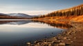 Blake Yukon Lake: Reflecting Mountain Ranges In Orange Sunset Royalty Free Stock Photo