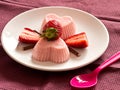 Blancmange with strawberries Royalty Free Stock Photo