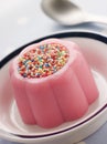 Blancmange topped with 100's and 1000's Royalty Free Stock Photo