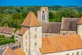 Blandy-les-Tours castle walls over Saint-Maurice church, France