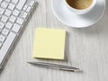 Blank adhesive note on desk Royalty Free Stock Photo