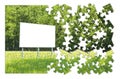 Blank advertising billboard immersed in a rural scene - concept image in jigsaw puzzle shape