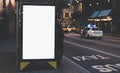 Blank advertising light box on bus stop, mockup of empty ad billboard on night bus station, template banner on background city Royalty Free Stock Photo