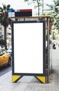 Blank advertising light box on bus stop, mockup of empty ad billboard on night bus station, template banner on background city Royalty Free Stock Photo