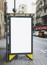 Blank advertising light box on bus stop, mockup of empty ad billboard on night bus station, template banner on background city Royalty Free Stock Photo