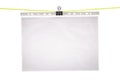 Blank advertising paper in plastic file hang on clip with clipping path Royalty Free Stock Photo