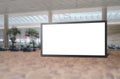 Blank advertising poster banner mockup in modern airport retail environment; large digital lightbox display screen. Billboard, Royalty Free Stock Photo