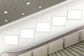 Blank advertising poster on underground escalator wall Royalty Free Stock Photo