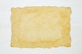 Blank antique old paper on white wooden background