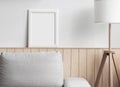 Blank artwork frame mockup on white wall. White living room design. View of modern scandinavian style interior with chair. Royalty Free Stock Photo