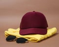 Blank baseball caps are used for design mockups. The hat on the side of an old camera and sunglasses. Royalty Free Stock Photo