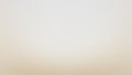 A blank beige background with a textured surface and subtle gradient effect from light to dark The neutral color provides a cl Royalty Free Stock Photo