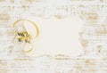 Blank beige gift tag on grunge white and gold Royalty Free Stock Photo