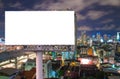 Blank billboard for advertisement in city downtown at night Royalty Free Stock Photo