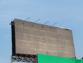 Blank billboard against blue sky for outdoor advertising poster in city Royalty Free Stock Photo