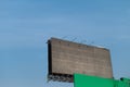 Blank billboard against blue sky for outdoor advertising poster in city Royalty Free Stock Photo