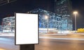 Blank billboard on a busy highway with traffic, neon lights Royalty Free Stock Photo