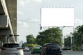 Blank billboard with copy space for text or content, mockup of a blank billboard in a big city, evening scene. Space for your ad Royalty Free Stock Photo