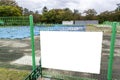 Blank billboard on fence of construction area