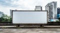 Blank billboard frame nestled amidst a bustling urban landscape, open canvas for creativity