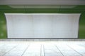 Blank billboard on green subway wall in empty hall
