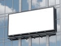 Blank billboard on modern office building against blue sky Royalty Free Stock Photo