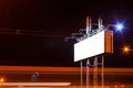 Blank billboard on night city street, mock up Royalty Free Stock Photo