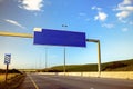 Blank billboard over an empty national highway