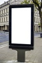 Mock up template. Blank billboard, public information board, advertising mock up banner in the city street Royalty Free Stock Photo